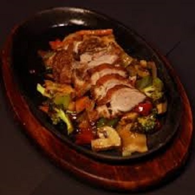 Pato a la bandeja quemada